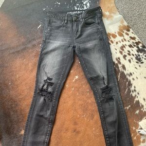 Distressed black American Eagle jeggings